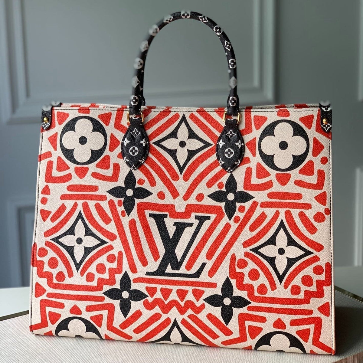L*V CRAFTY ONTHEGO GM CREAM AND RED MONOGRAM GIANT CANVAS