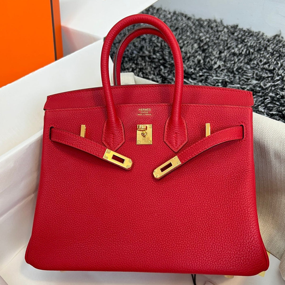 H*M B*RKIN 25CM RED TOGO LEATHER GOLD HARDWARE