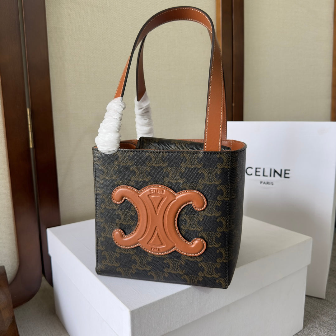 CUBE BAG 15 IN BLACK TRI*MPHE CANVAS AND BROWN CALFSKIN
