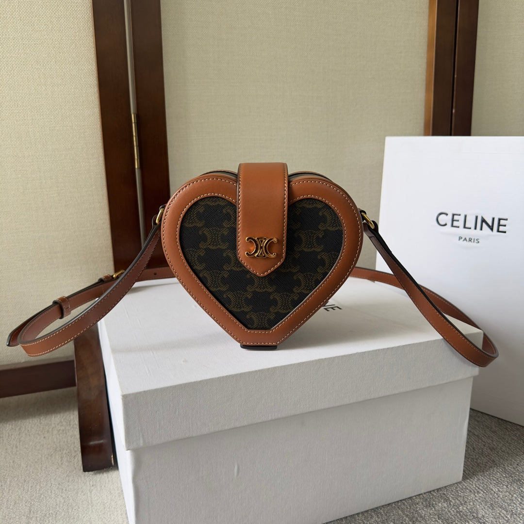 HEART TAMBOUR BAG 15 IN BLACK TRI*MPHE CANVAS AND BRONZE BROWN CALFSKIN