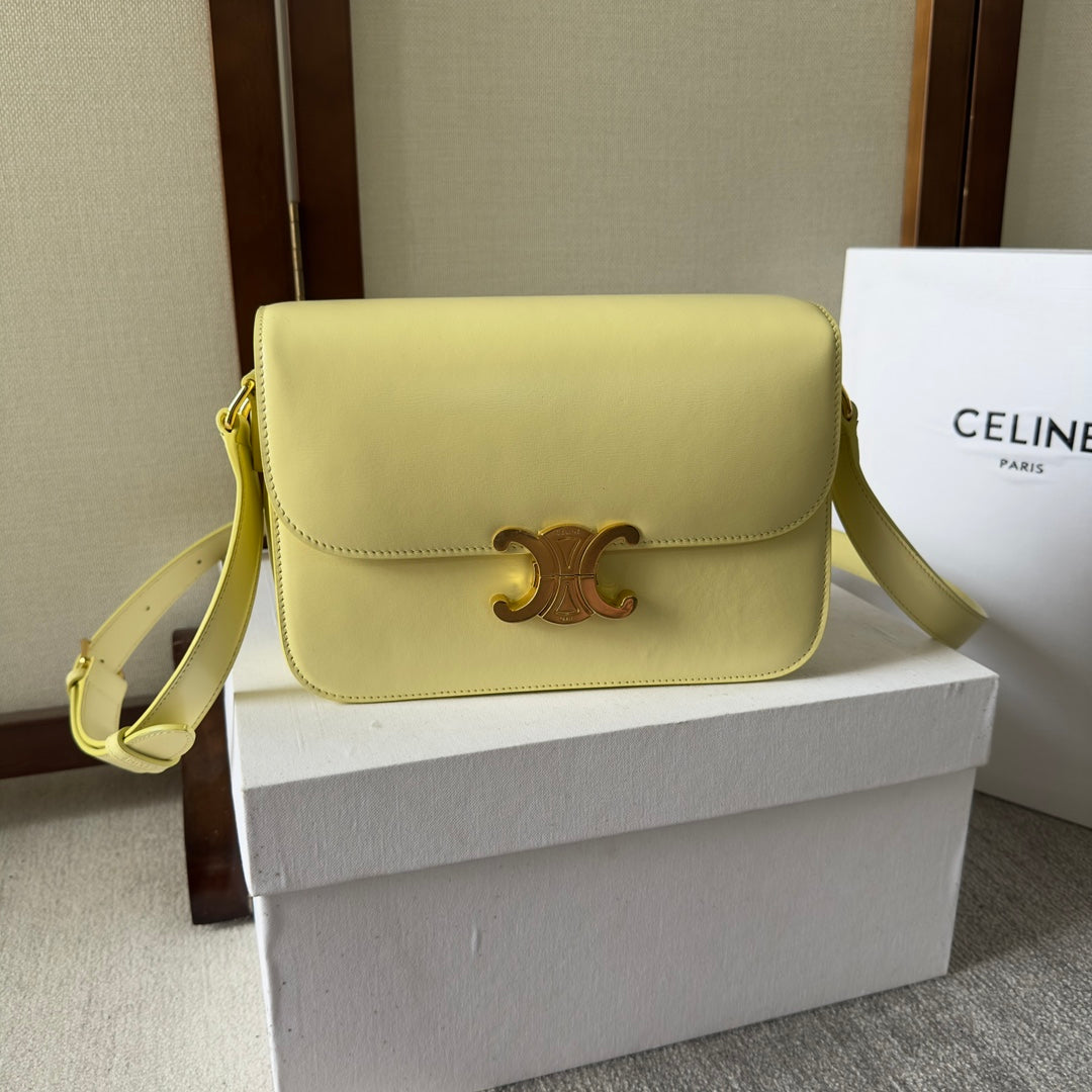 CLASSIQUE TRI*MPHE BAG 22 IN YELLOW CALFSKIN