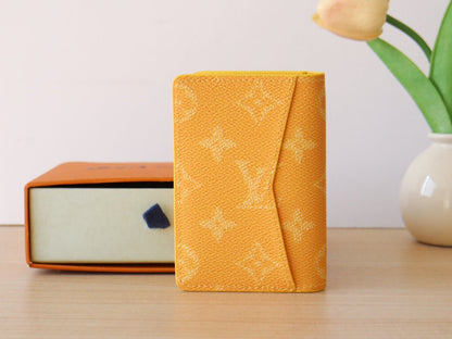 LV Pocket Organizer Monogram Heritage Canvas