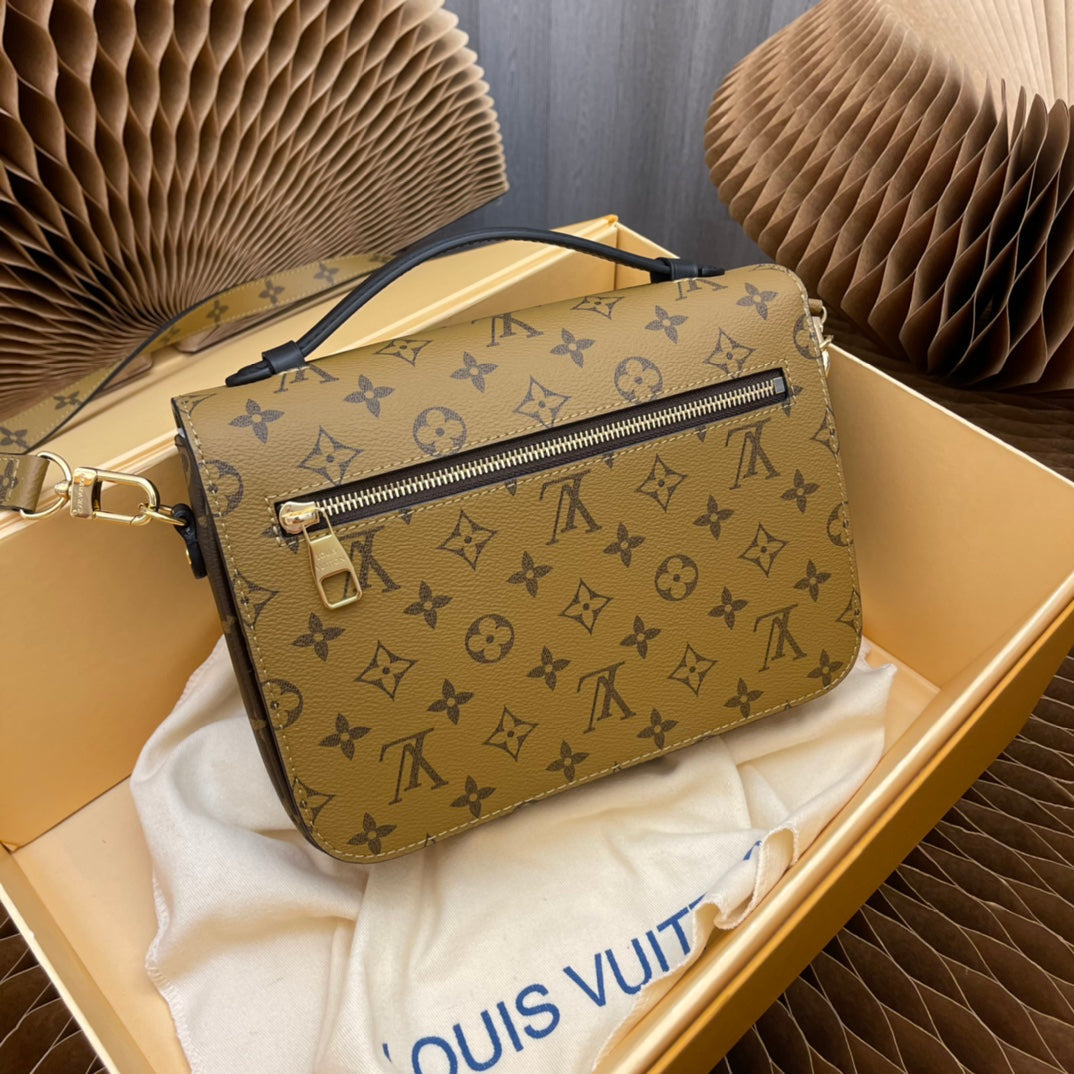 pochette metis 25 monogram reverse canvas